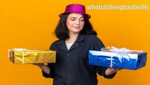Woman wearing a party hat comparing a gold and blue gift WhatUTalkingBoutWillis presents against yellow background.