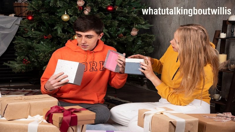 Young couple opening Christmas presents on a whatutalkingboutwillis gift guide featured photo.